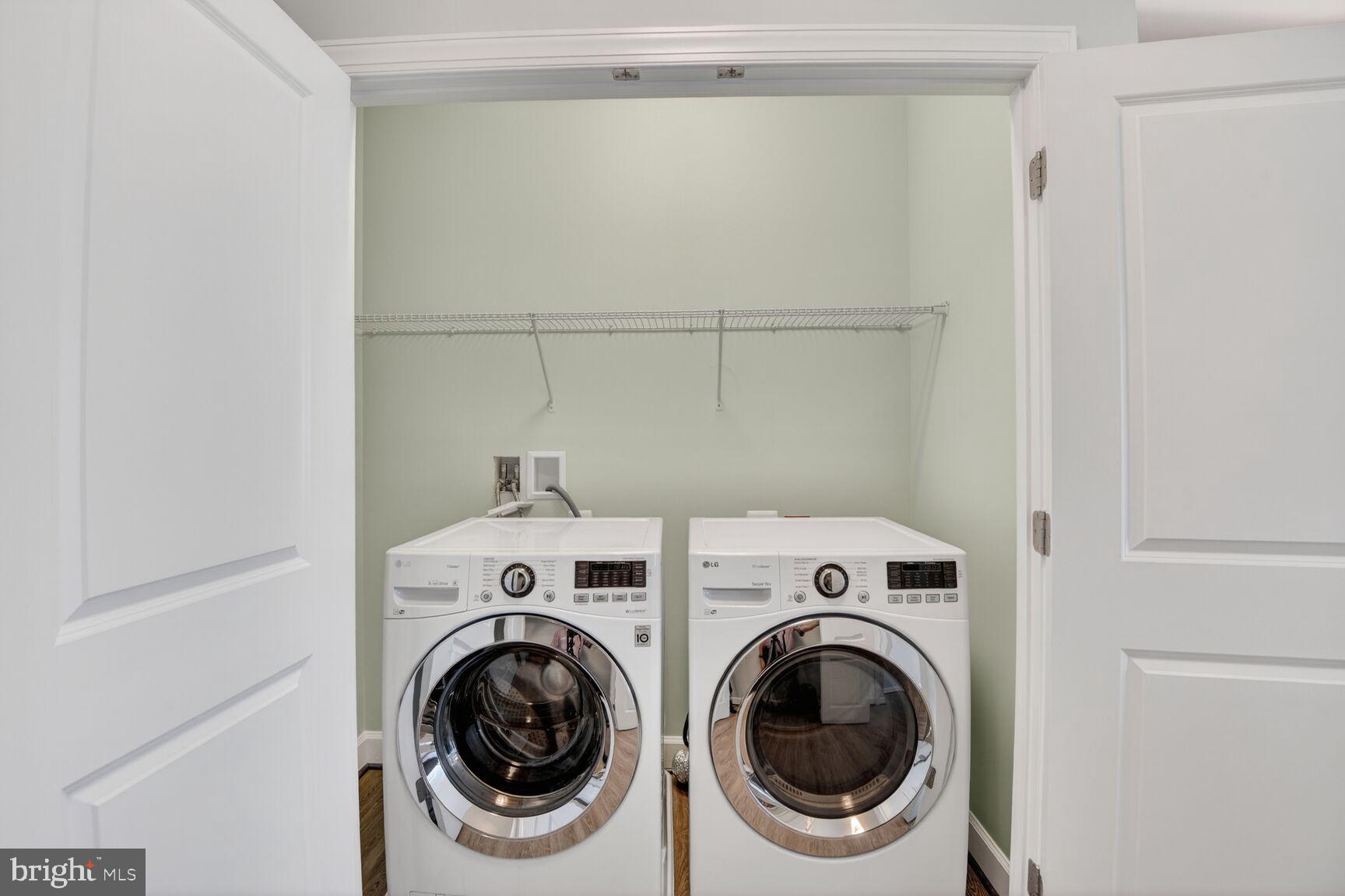 10530 Resort Road, Unit 210 Ellicott City, MD 21042 - Photo 23 of 35 a utility room with dryer and washer