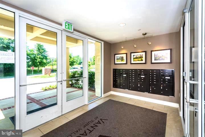 10530 Resort Road, Unit 210 Ellicott City, MD 21042 - Photo 27 of 35 Entry w/ Mailboxes