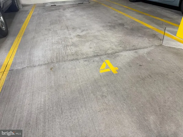 a view of a swimming pool with a lounge chair