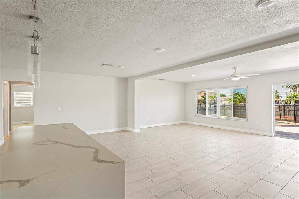 516 Crystal Drive Madeira Beach, FL 33708 - Photo 13 of 25 an empty room with windows