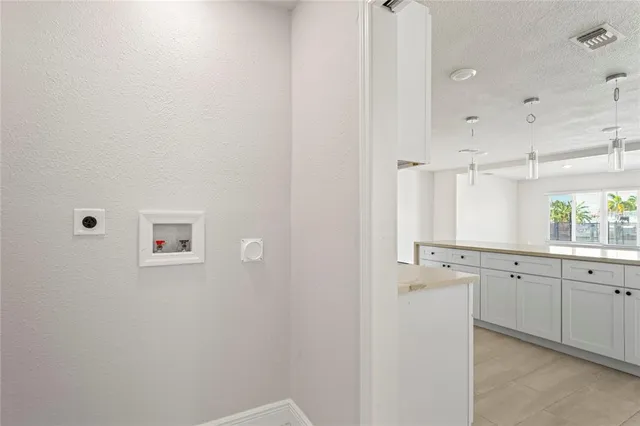 a view of a room with racks on the wall