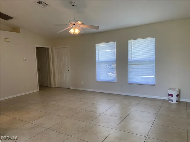 a kitchen with a sink stove and microwave