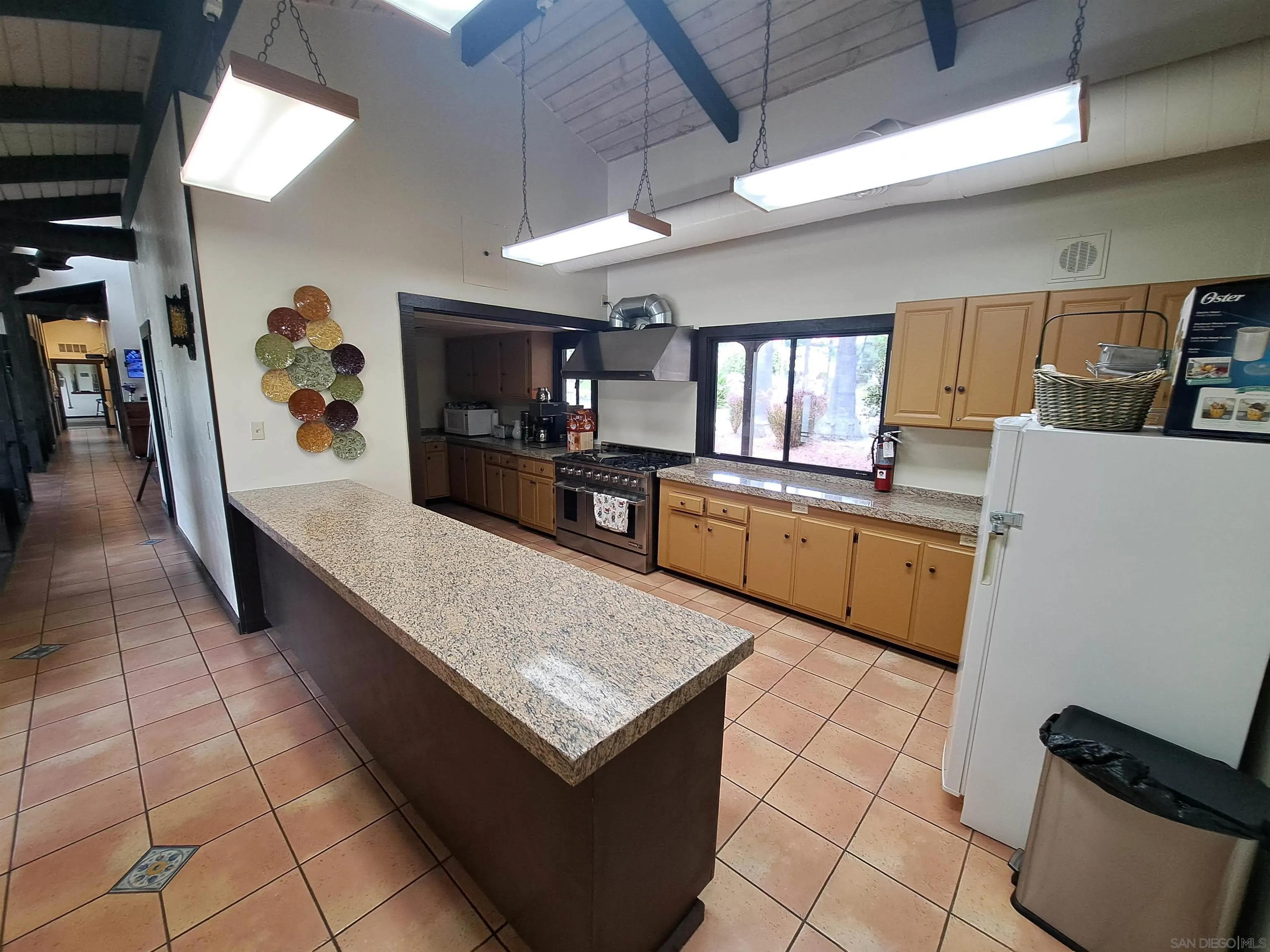 4650 Dulin Road, Unit 12 Fallbrook, CA 92003 - Photo 35 of 36 a large kitchen with lots of counter space and window