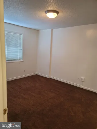 a view of small space with wooden floor