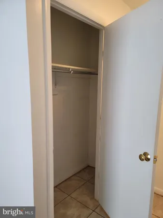 a view of an empty room with a balcony