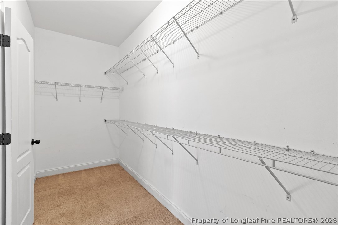 368 Exeter Drive Raeford, NC 28376 - Photo 23 of 49 a view of a room with racks on the wall