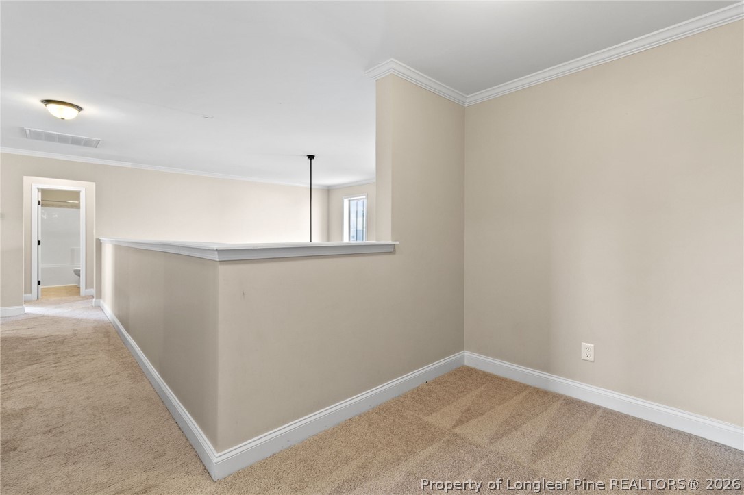 368 Exeter Drive Raeford, NC 28376 - Photo 29 of 49 an empty room with a empty space and windows