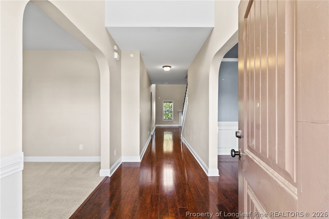 368 Exeter Drive Raeford, NC 28376 - Photo 3 of 49 a view of gallery with wooden floor