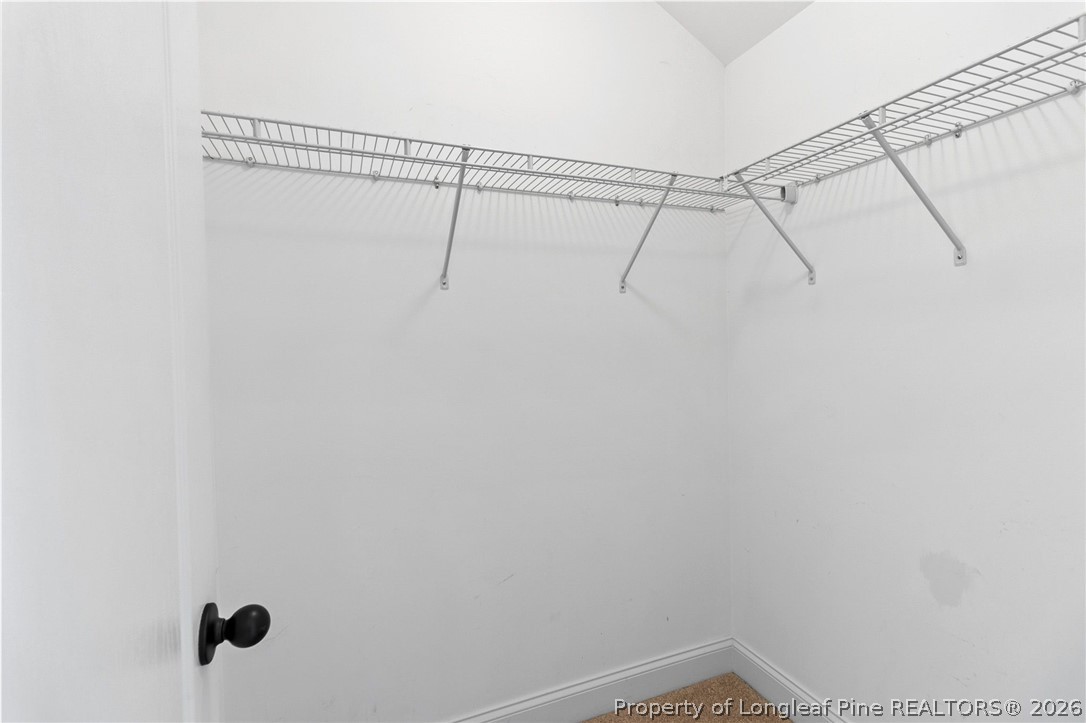 368 Exeter Drive Raeford, NC 28376 - Photo 37 of 49 a view of a room with racks on the wall