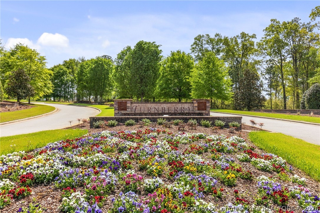 368 Exeter Drive Raeford, NC 28376 - Photo 45 of 49 a view of a swimming pool with an outdoor space and seating area