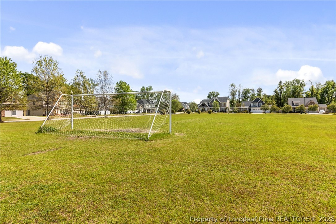 368 Exeter Drive Raeford, NC 28376 - Photo 46 of 49 a view of a big yard with palm trees
