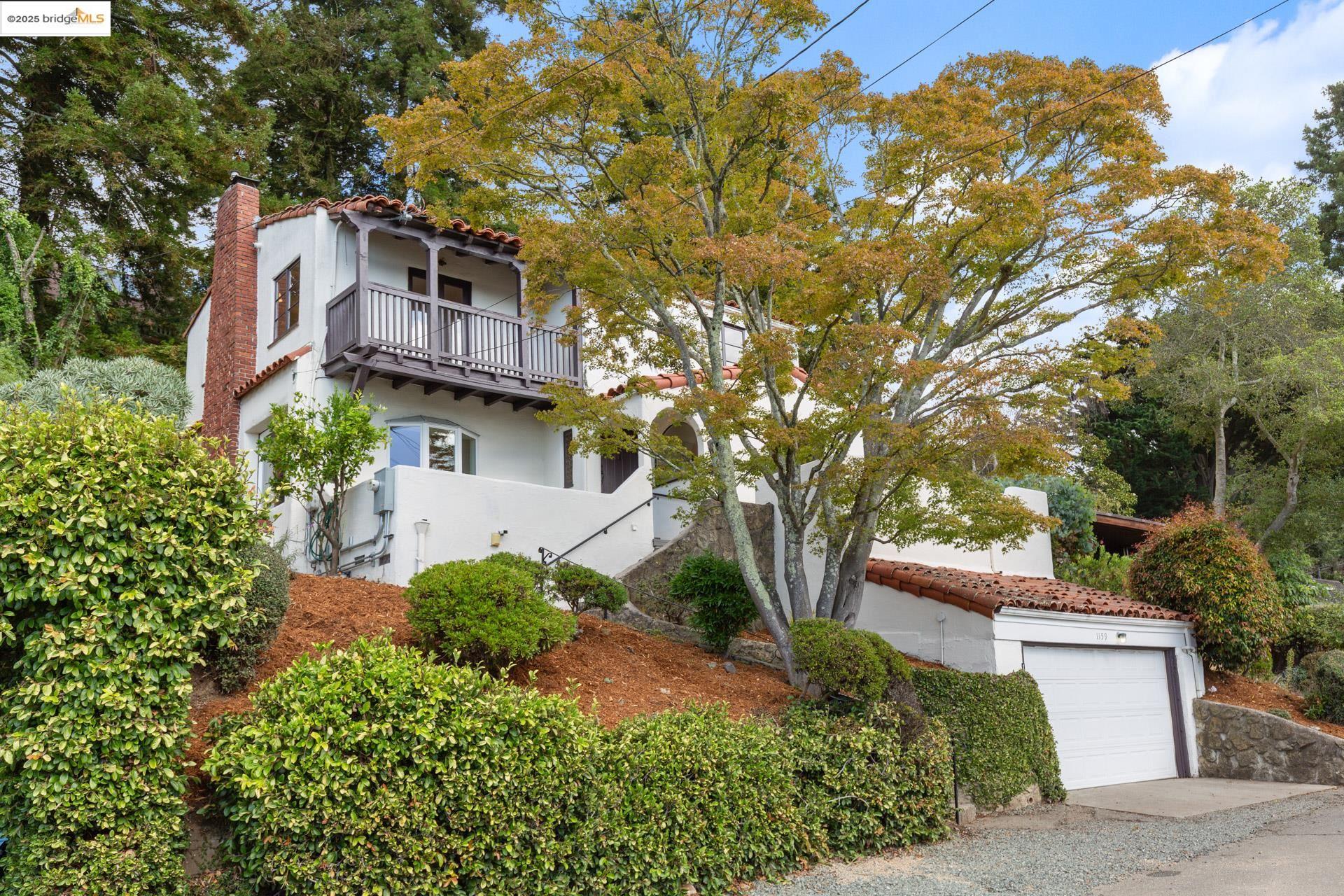 1159 Keeler Avenue Berkeley, CA 94708 - Photo 1 of 1 a front view of a house with a yard