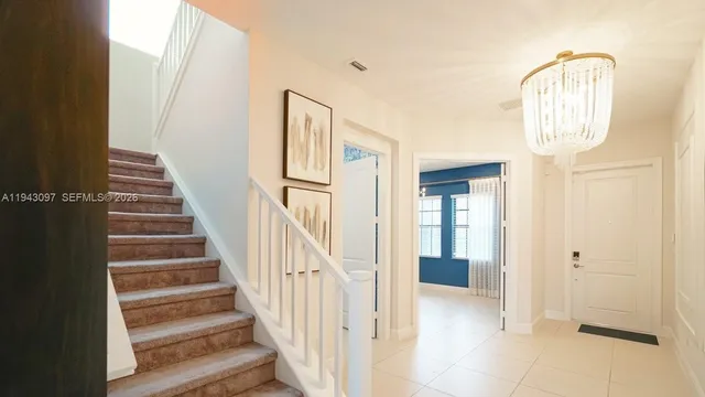 a bathroom with a double vanity sink and mirror