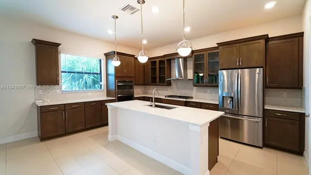 $1,440,000 | 8725 Parkland Bay Drive, Parkland, FL 33076