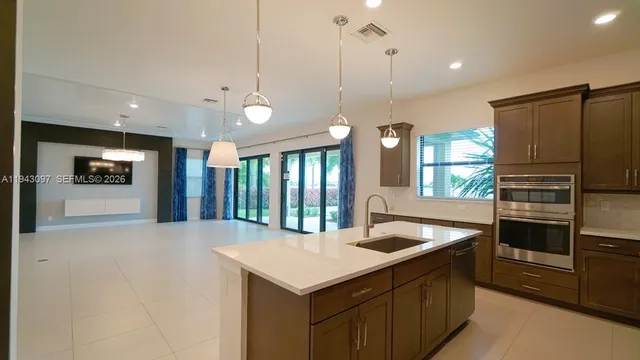 $1,440,000 | 8725 Parkland Bay Drive, Parkland, FL 33076