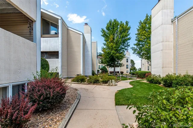a view of a house with a garden