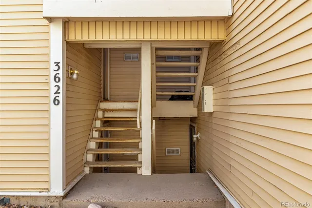 a view of entryway with stairs