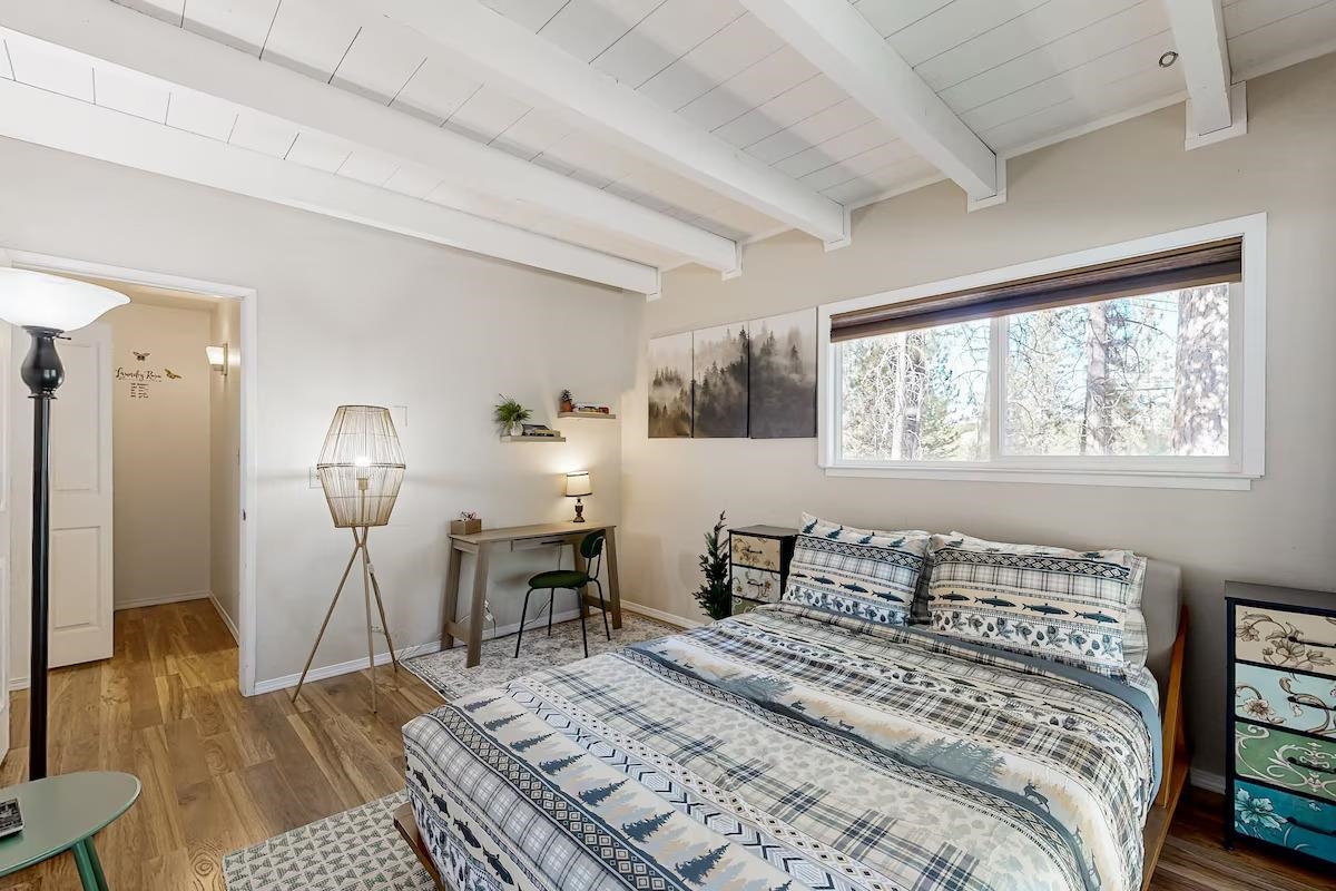 19385 Ferretti Road Groveland, CA 95321 - Photo 12 of 47 Bedroom with light wood-type flooring and beamed ceiling