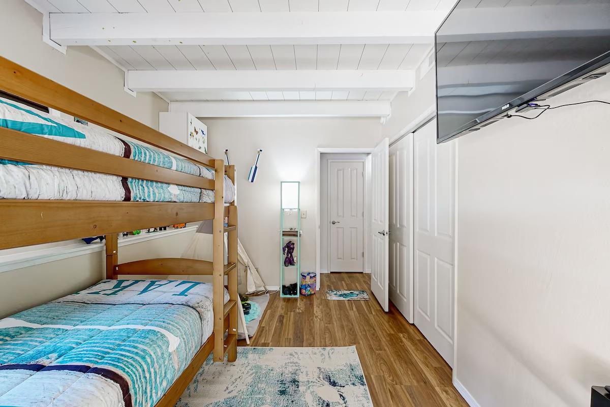 19385 Ferretti Road Groveland, CA 95321 - Photo 16 of 47 Bedroom featuring wood finished floors, a closet, and wood ceiling