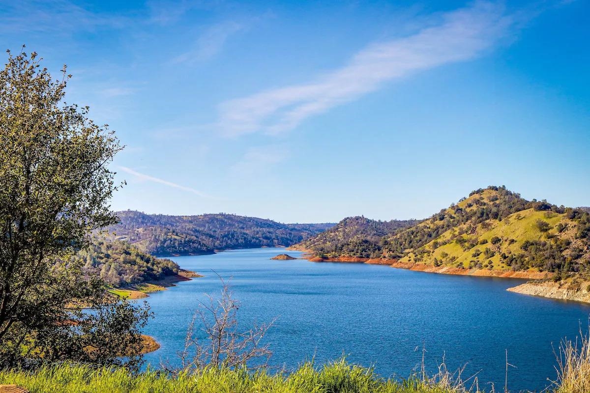 19385 Ferretti Road Groveland, CA 95321 - Photo 26 of 47 Water view featuring a heavily wooded area