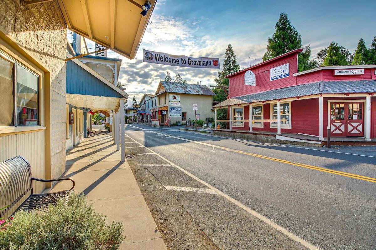 19385 Ferretti Road Groveland, CA 95321 - Photo 30 of 47 View of asphalt road with sidewalks and curbs