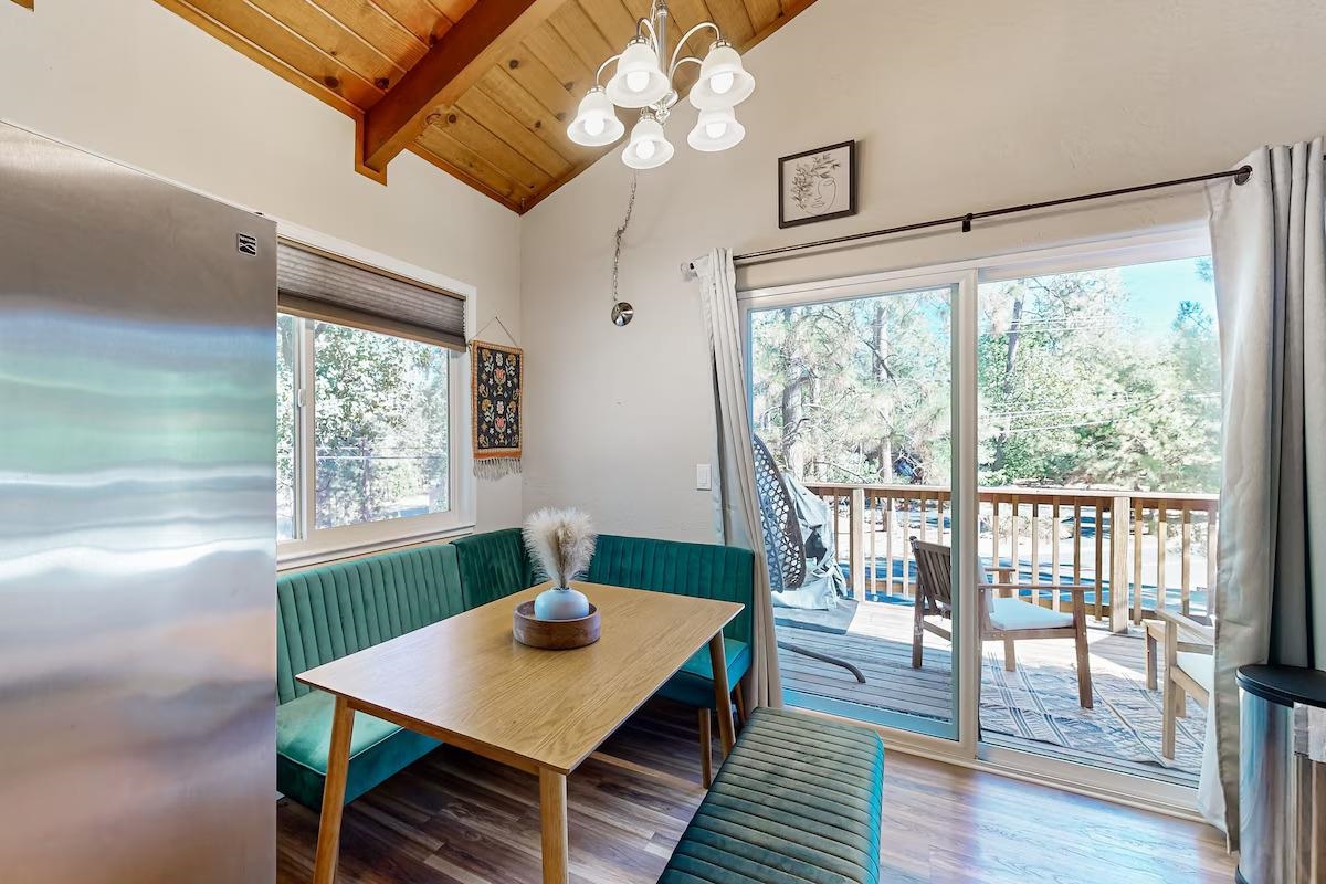 19385 Ferretti Road Groveland, CA 95321 - Photo 8 of 47 Dining room featuring wood ceiling, a chandelier, and wood finished floors