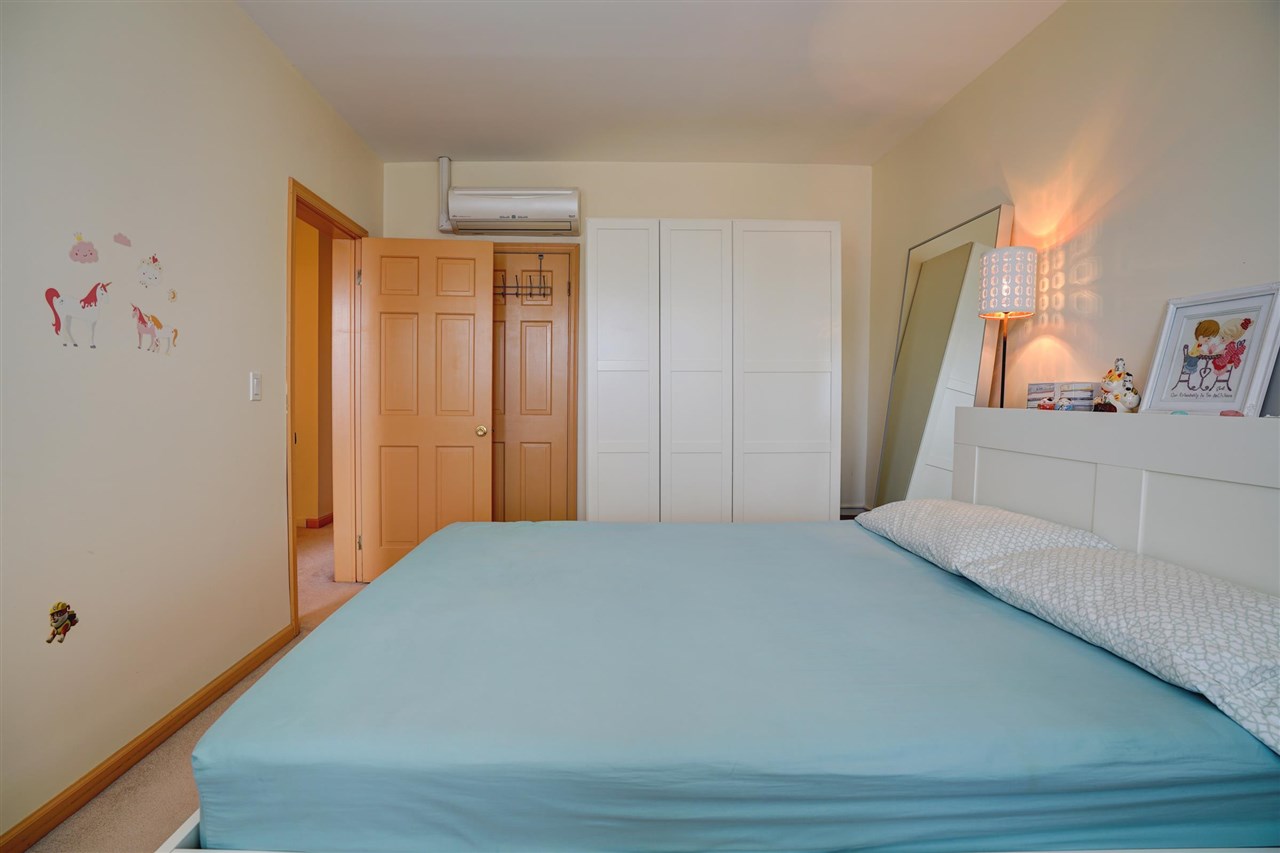 527 North 3rd Street East Newark, NJ 07029 - Photo 15 of 25 a bedroom with a bed and a window