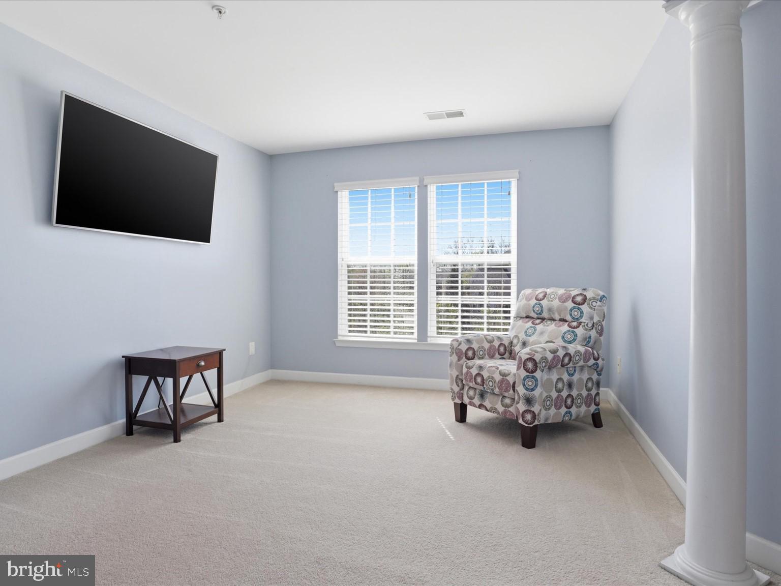 14202 Derby Ridge Road Bowie, MD 20721 - Photo 28 of 57 SITING ROOM WITH WALL MOUNT TV