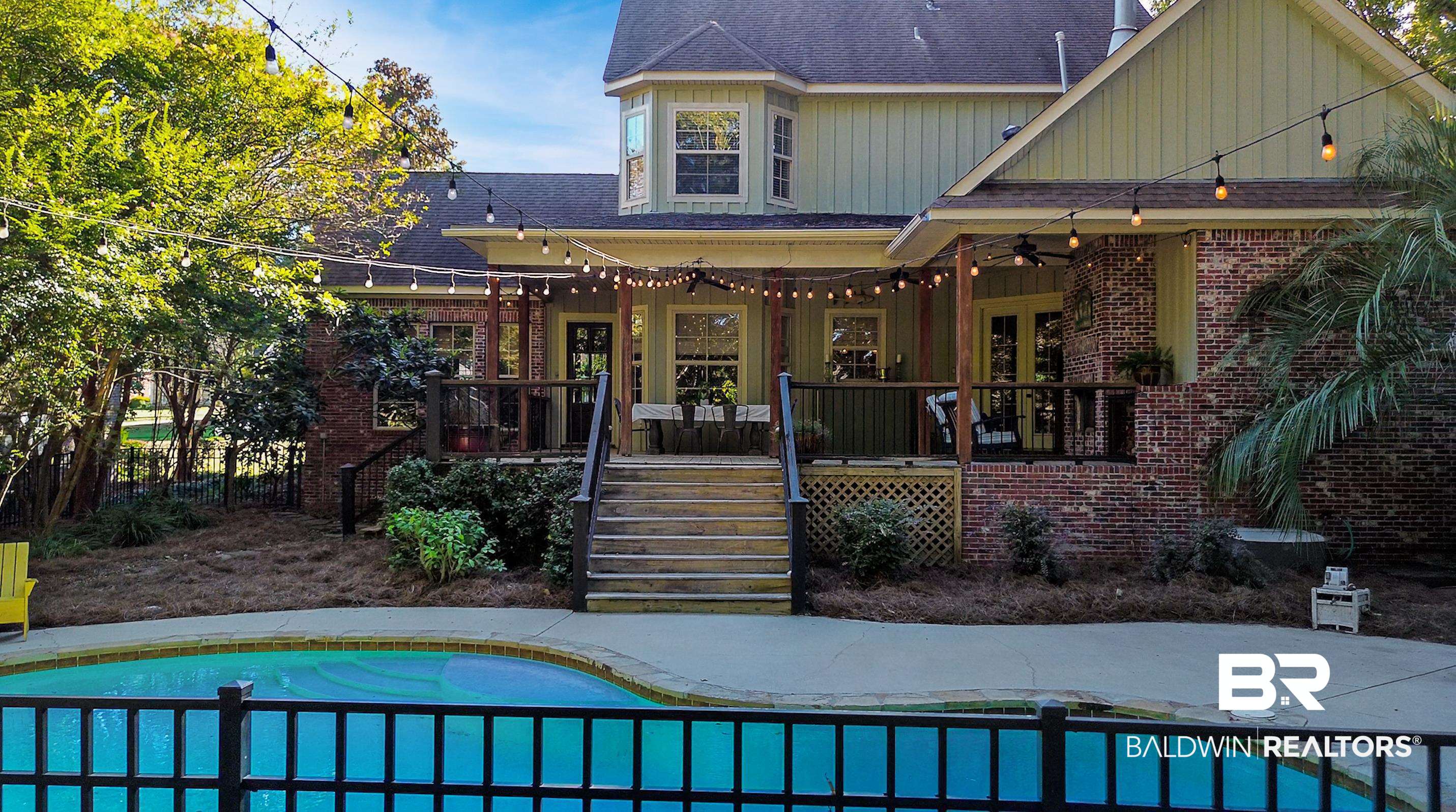 8868 Dawes Lake Road South Mobile, AL 36619 - Photo 33 of 35 View of swimming pool with ceiling fan and a deck