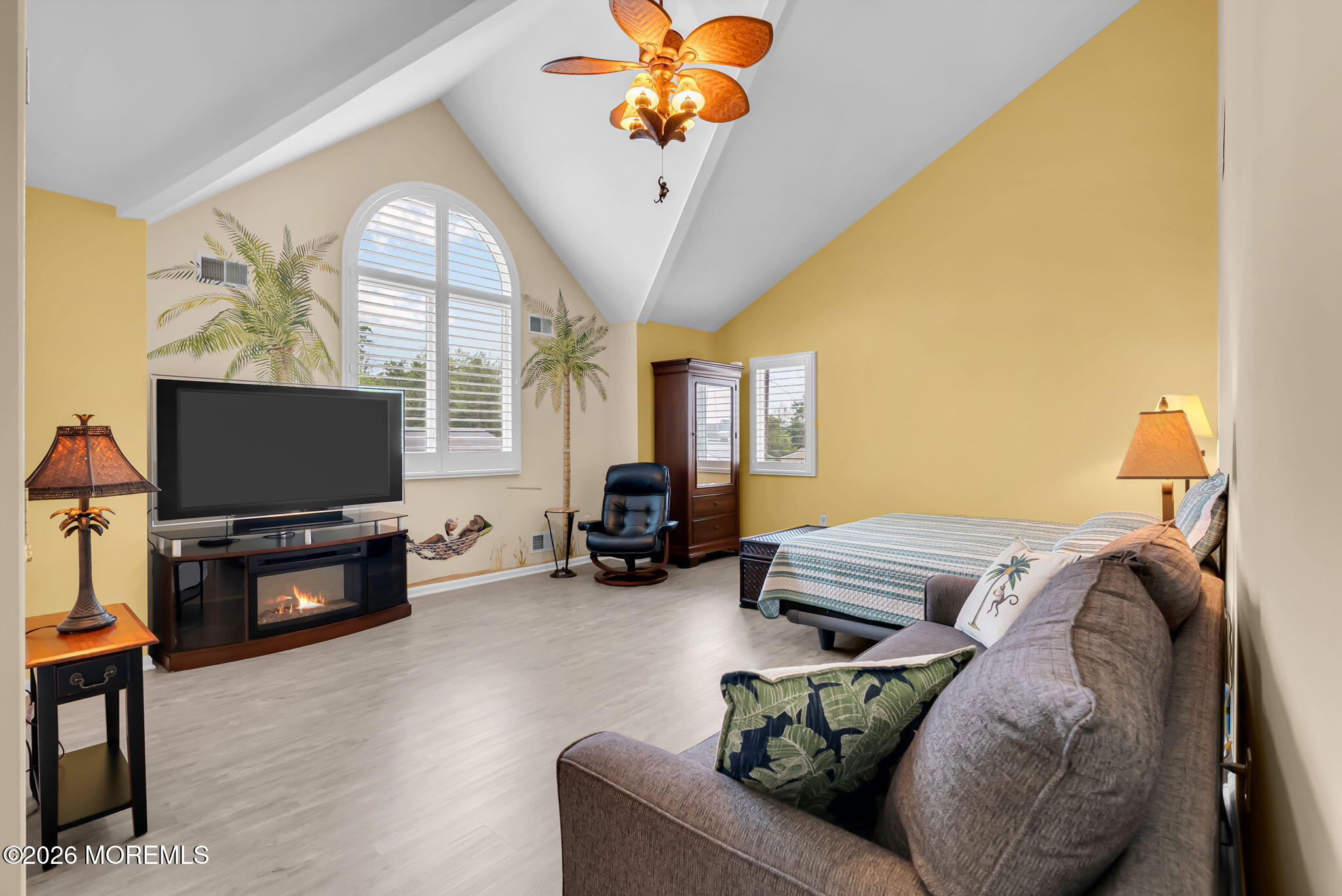 9 Cross Trees Road Brick, NJ 08723 - Photo 67 of 126 a living room with furniture and a flat screen tv with wooden floor