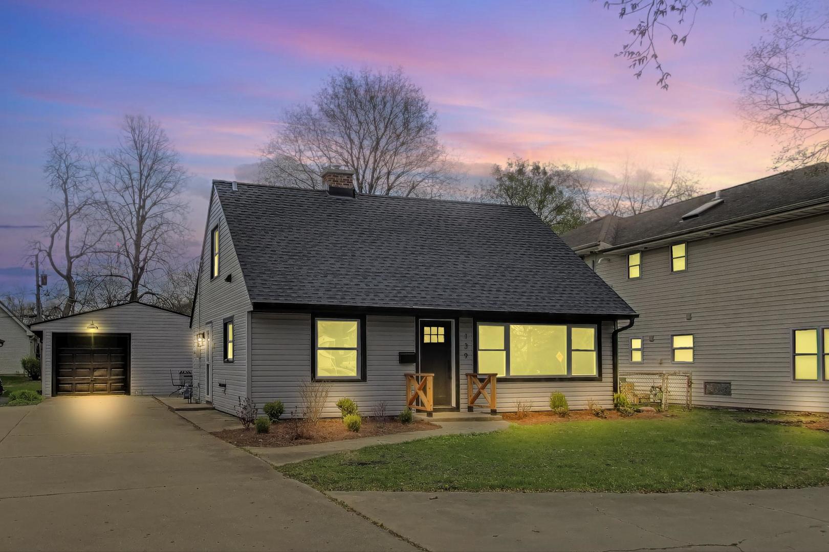 139 South Quentin Road Palatine, IL 60067 - Photo 1 of 23 a front view of a house with a yard