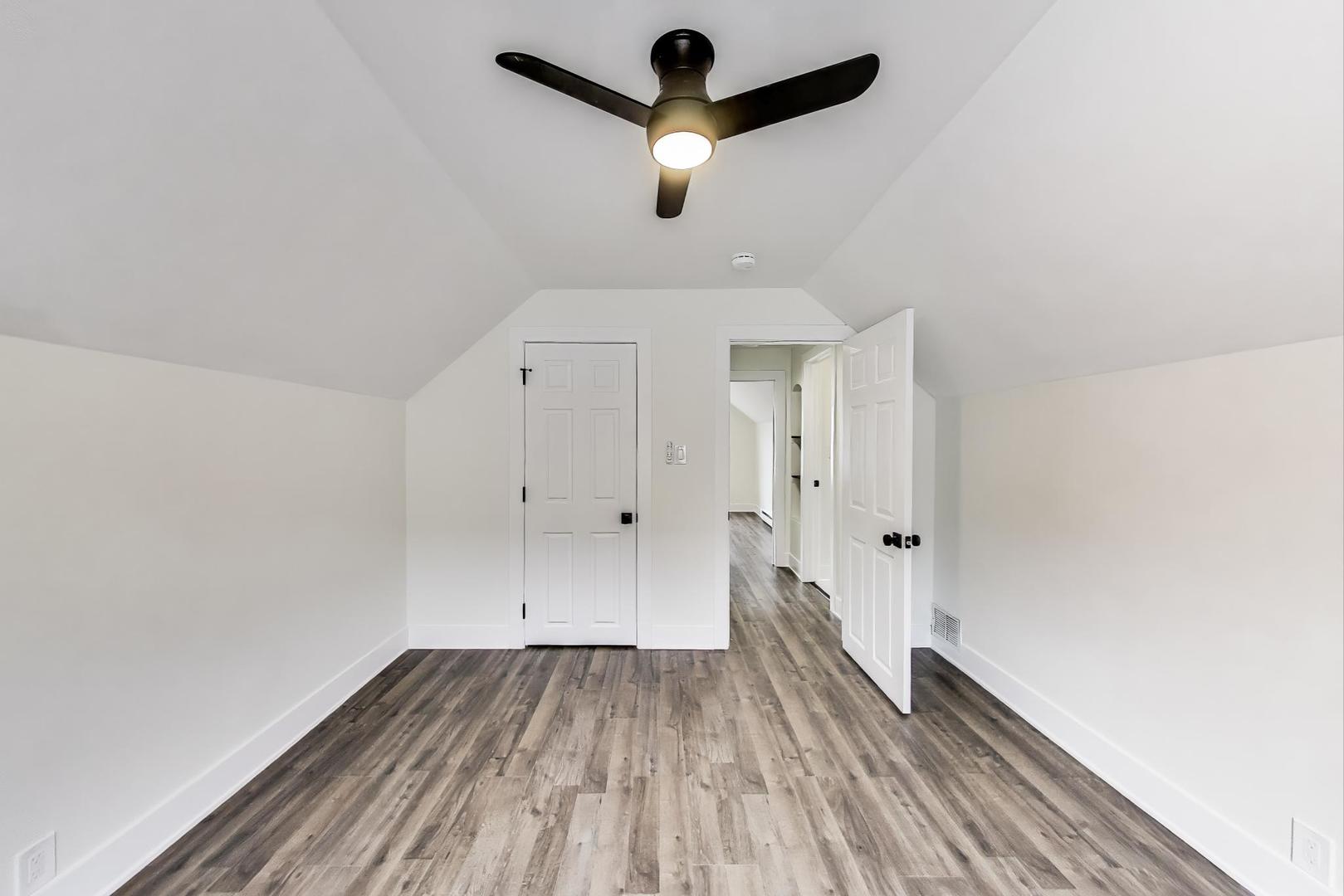139 South Quentin Road Palatine, IL 60067 - Photo 12 of 23 a view of empty room with wooden floor