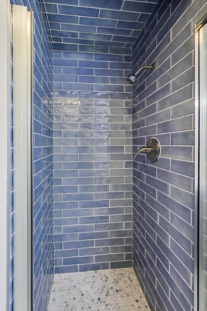 139 South Quentin Road Palatine, IL 60067 - Photo 16 of 23 a bathroom with a shower