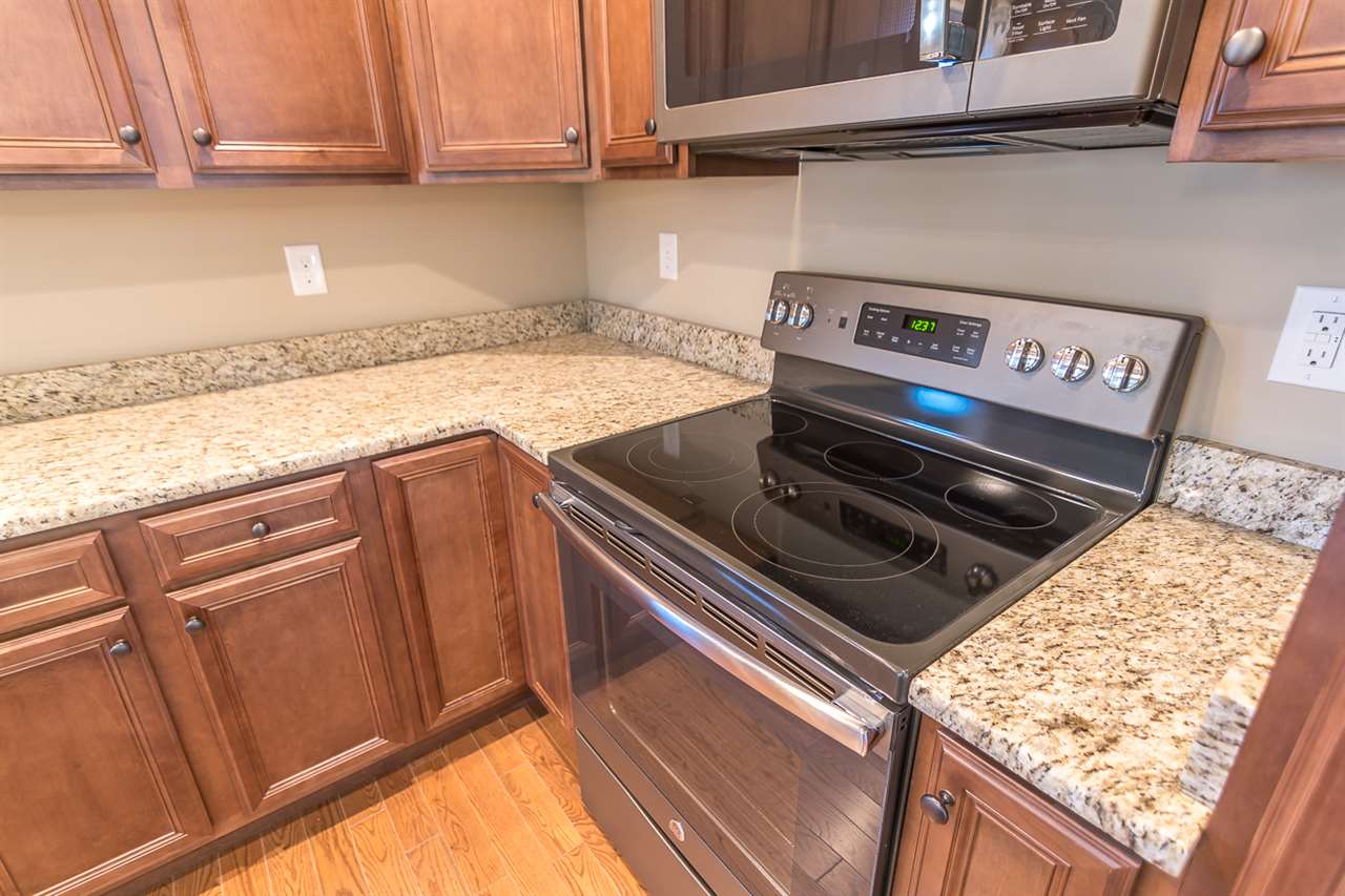 900 Riverside Avenue Grottoes, VA 24441 - Photo 19 of 37 a stove top oven sitting inside of a kitchen