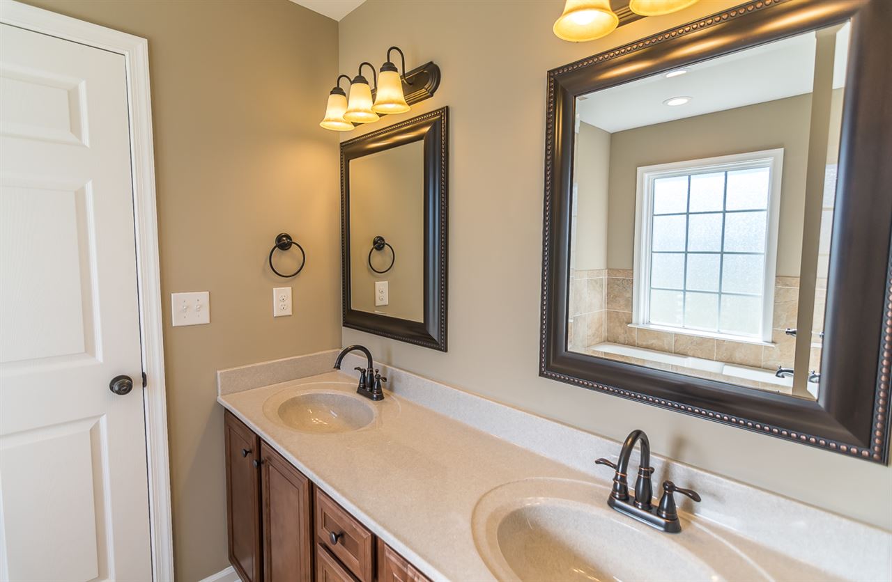 900 Riverside Avenue Grottoes, VA 24441 - Photo 32 of 37 a bathroom with a sink and a mirror