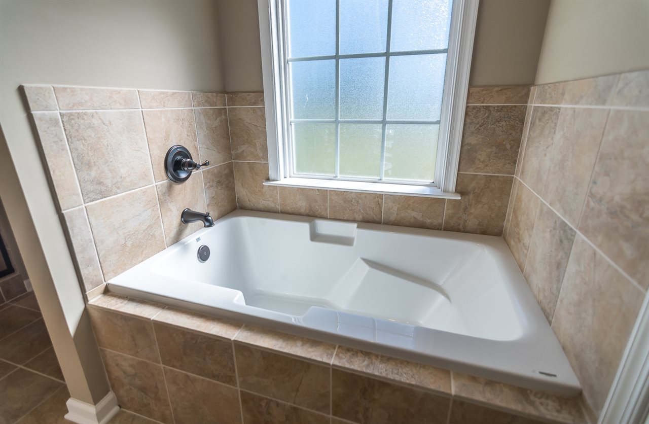 900 Riverside Avenue Grottoes, VA 24441 - Photo 33 of 37 a bathroom with a sink and a tub