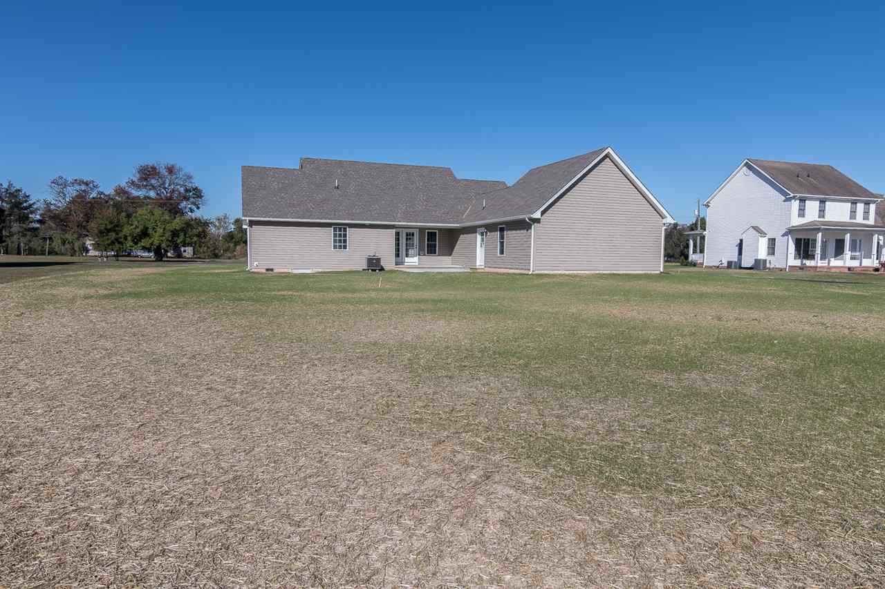 900 Riverside Avenue Grottoes, VA 24441 - Photo 37 of 37 a view of a house next to a big yard