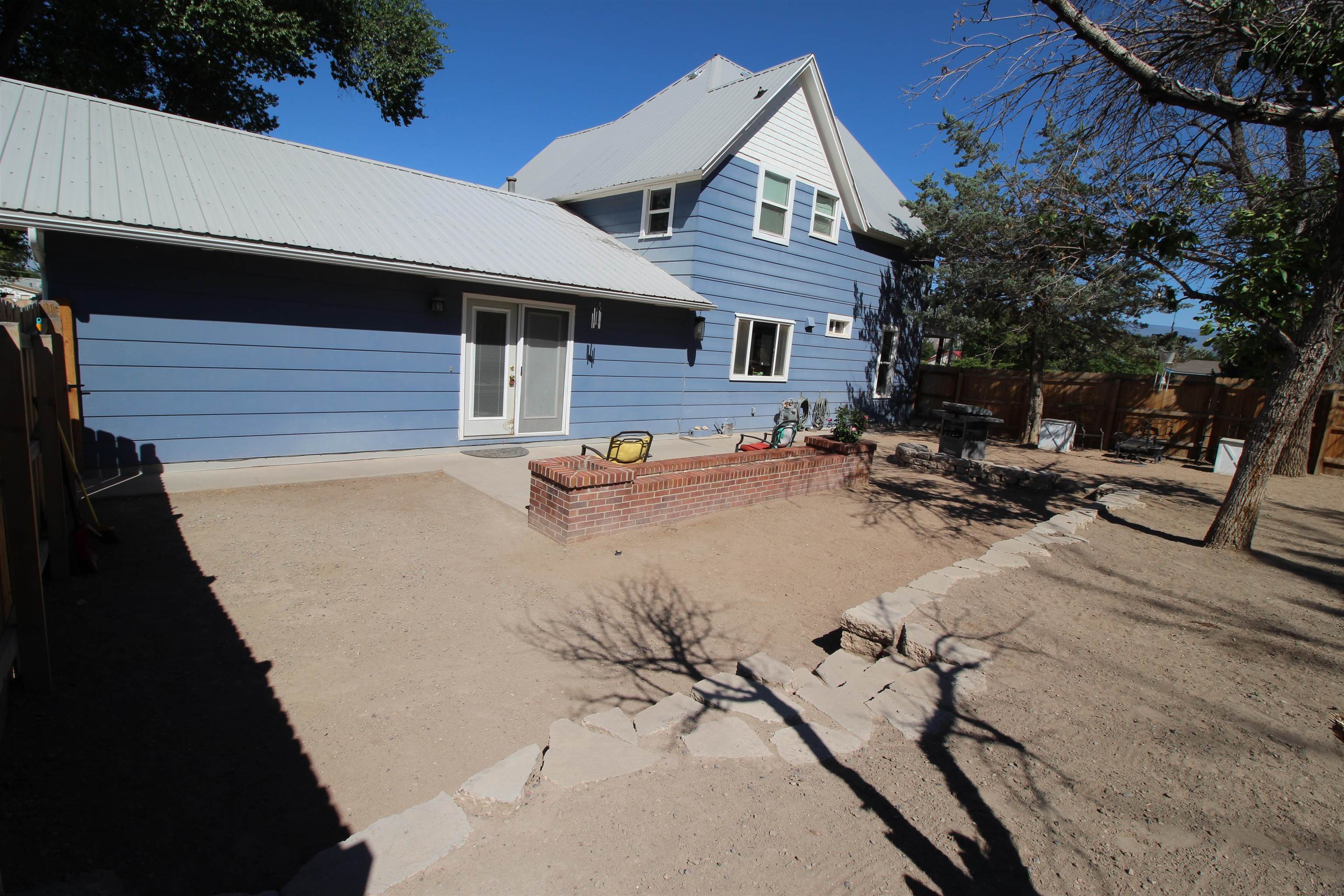 1150 East 7th Street Delta, CO 81416 - Photo 25 of 32 a view of a house with patio
