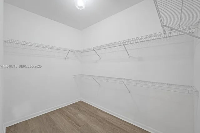 a view of a room with racks on the wall