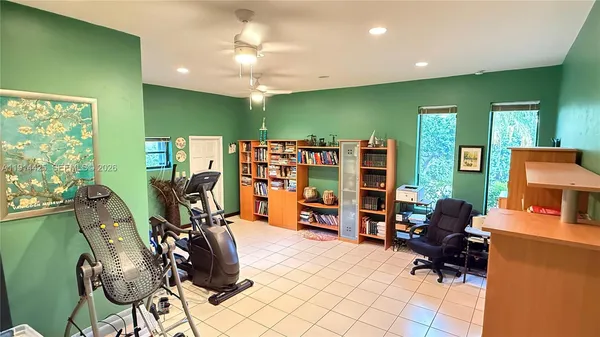 a room with furniture and a large window