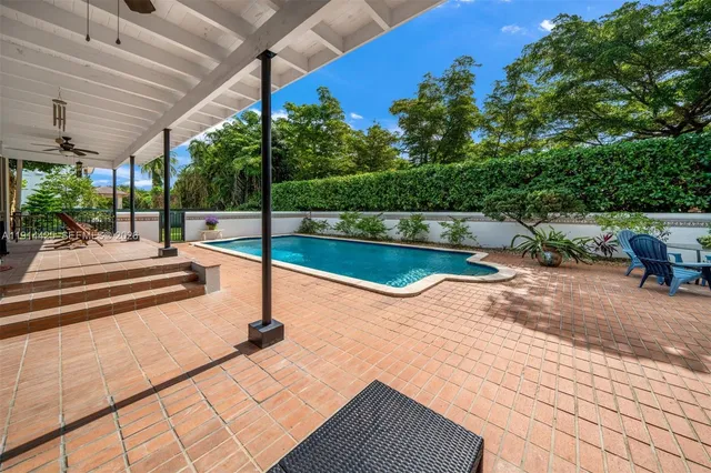 a view of house with outdoor entertaining spaces