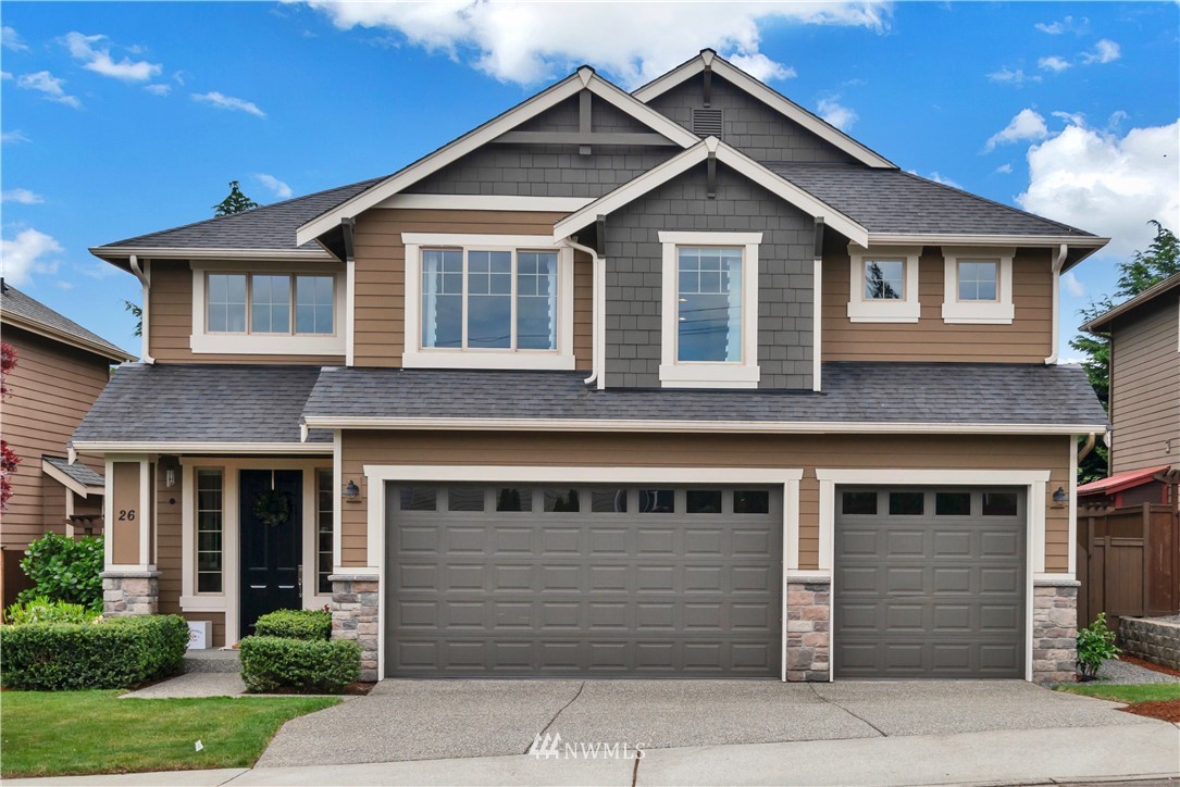 26 212th Street Southwest Bothell, WA 98021 - Photo 1 of 25 a front view of a house with a yard