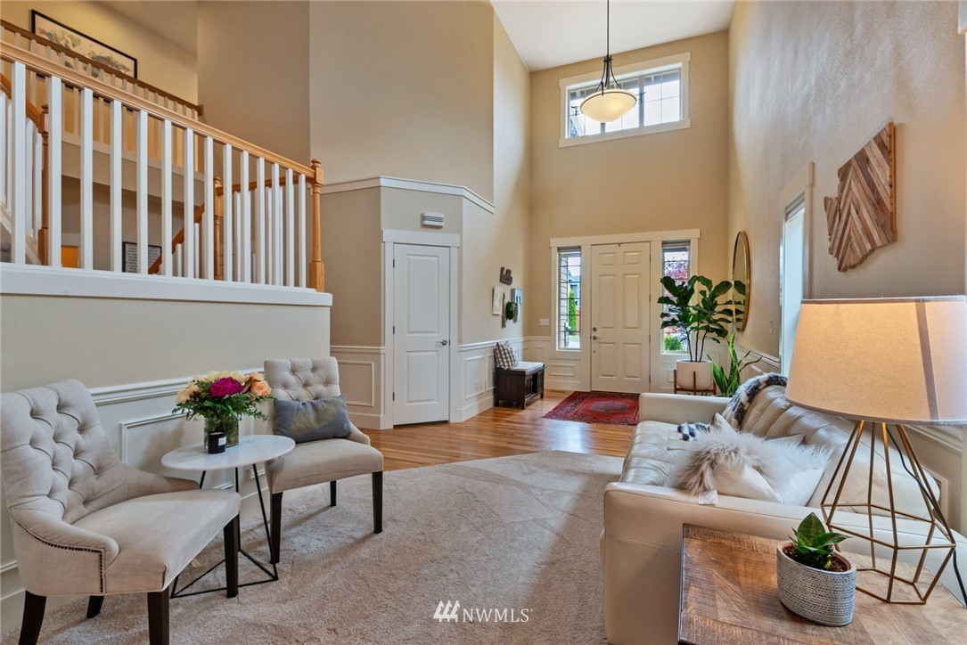 26 212th Street Southwest Bothell, WA 98021 - Photo 5 of 25 a living room with furniture and wooden floor