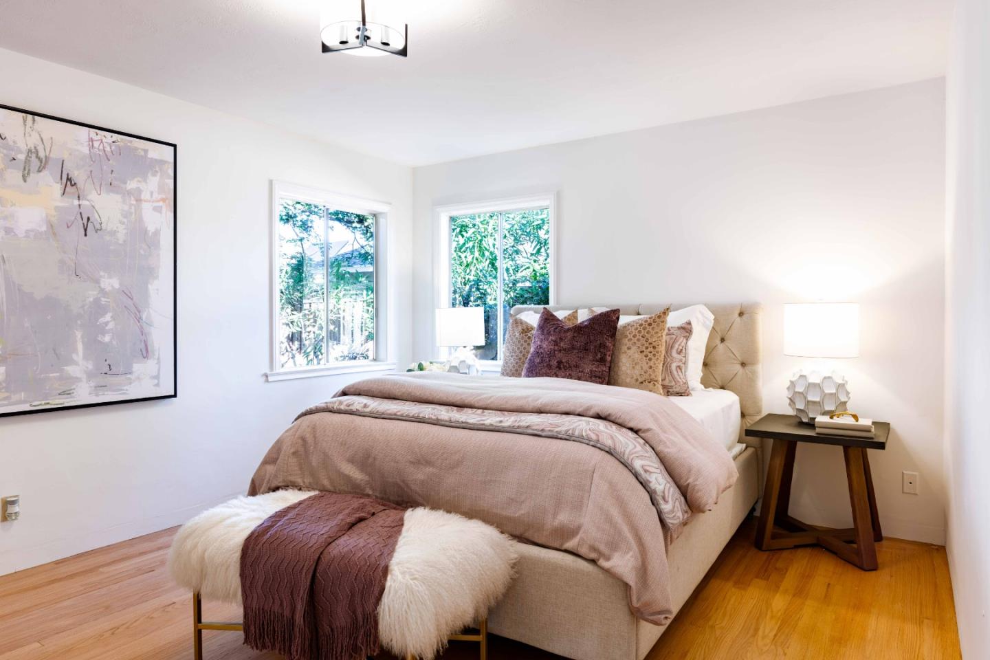 764 Parma Way Los Altos, CA 94024 - Photo 15 of 21 a bed sitting in a bedroom next to a window