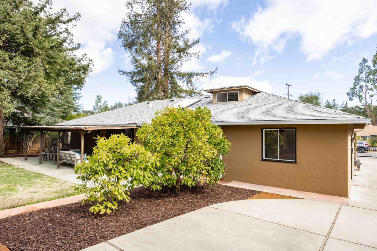 764 Parma Way Los Altos, CA 94024 - Photo 17 of 21 a front view of a house with garden