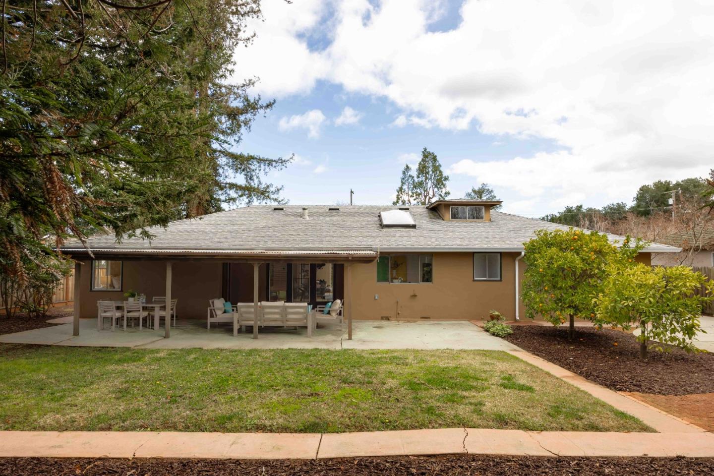 764 Parma Way Los Altos, CA 94024 - Photo 18 of 21 a front view of a house with garden