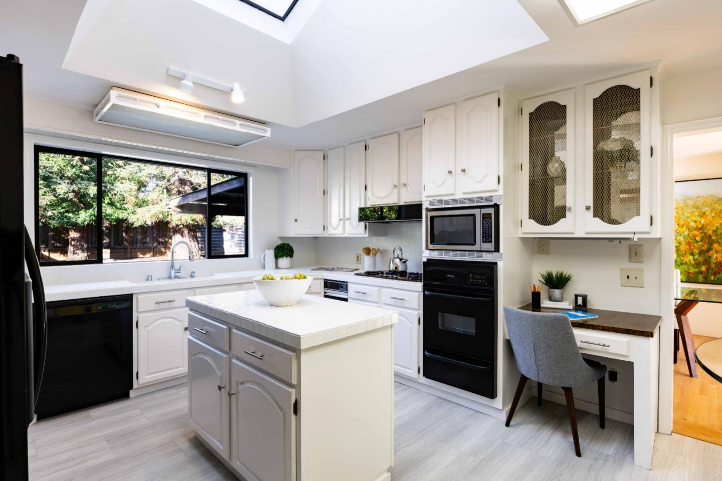 764 Parma Way Los Altos, CA 94024 - Photo 8 of 21 a kitchen with a sink a stove a refrigerator and cabinets