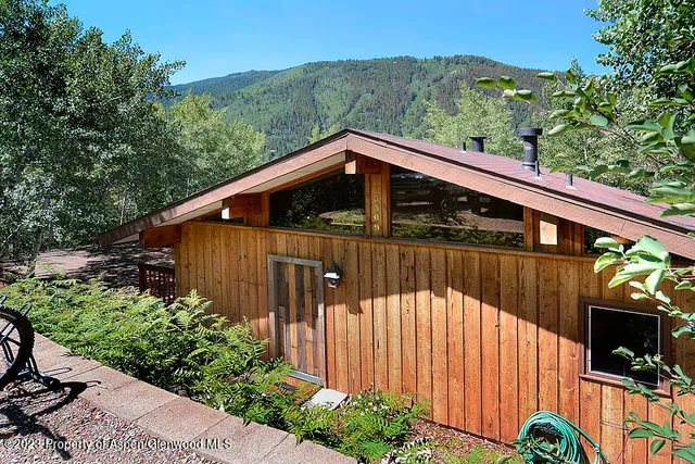 a view of balcony with furniture