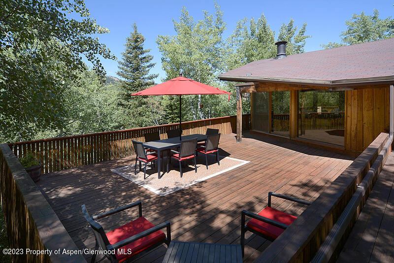309 Mountain Laurel Drive Aspen, CO 81611 - Photo 2 of 14 a view of a roof deck with furniture