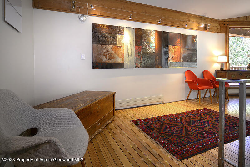 309 Mountain Laurel Drive Aspen, CO 81611 - Photo 5 of 14 a bedroom with a bed and window